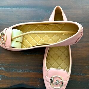 Michael Kors ballet flats. Size 10. Leather. Pink color. Rubber and suede trim.